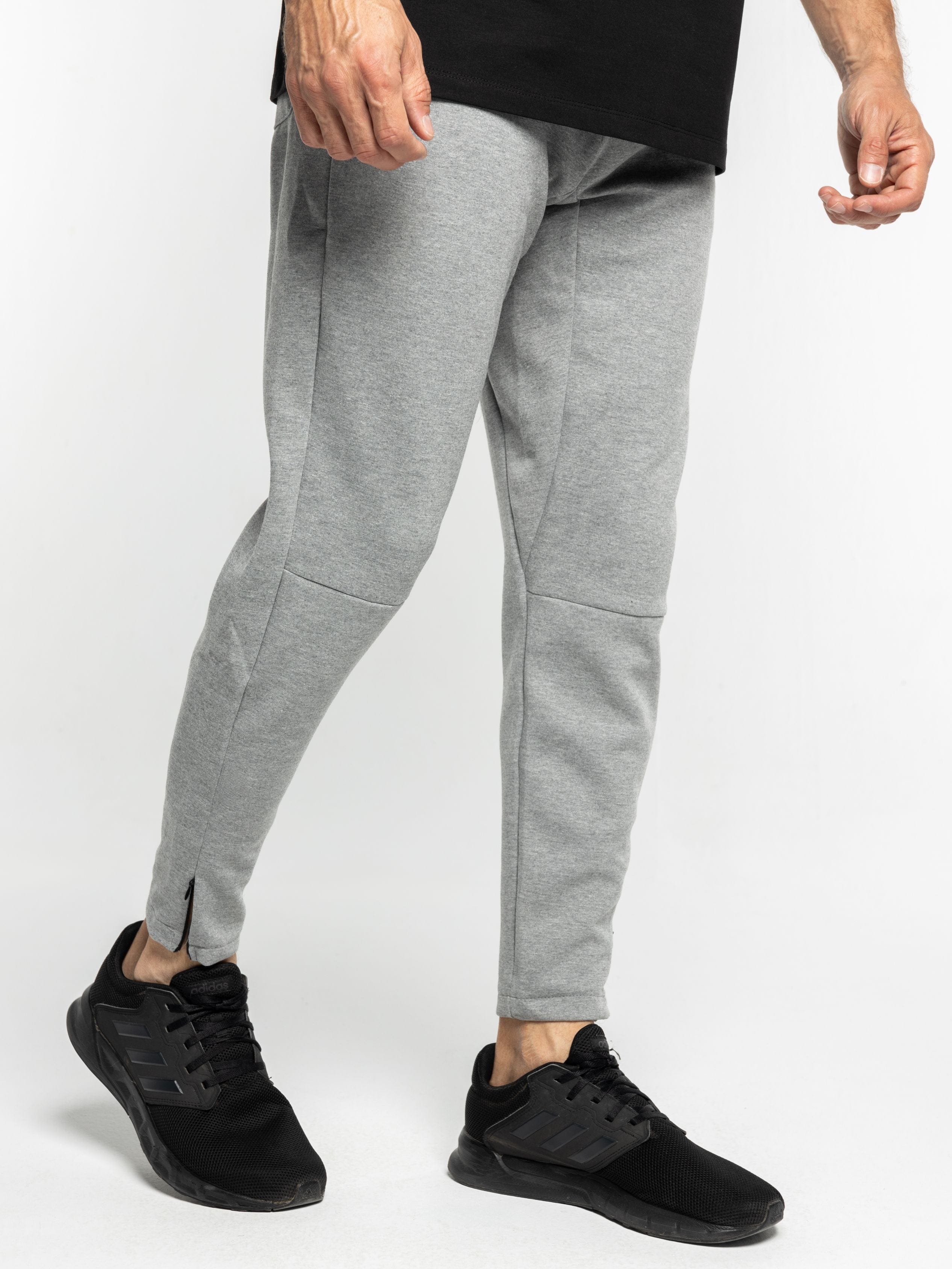 Nike sweatpants zipper best sale